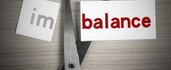 scissor cutting paper that says imbalance